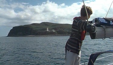 Stowing the Mainsail off Davaar Island