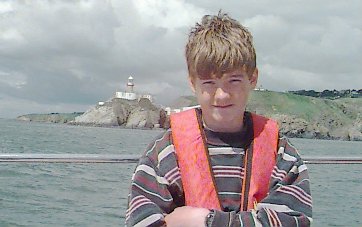 Philip - with Bailey Lighthouse on Howth Head in the background 